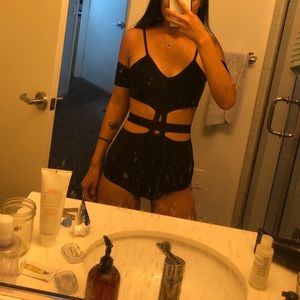 Black bondage body suit rave festival